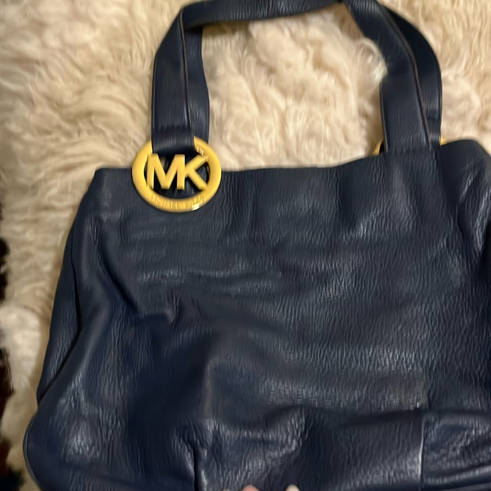MK navy bag, gently used, no flaws, dust bag included, cat friendly home.